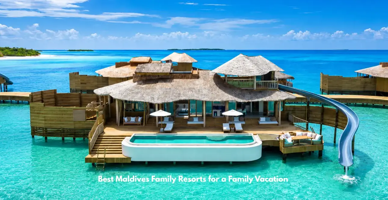 Luxury overwater villa with pool and waterslide at a Maldives family resort.