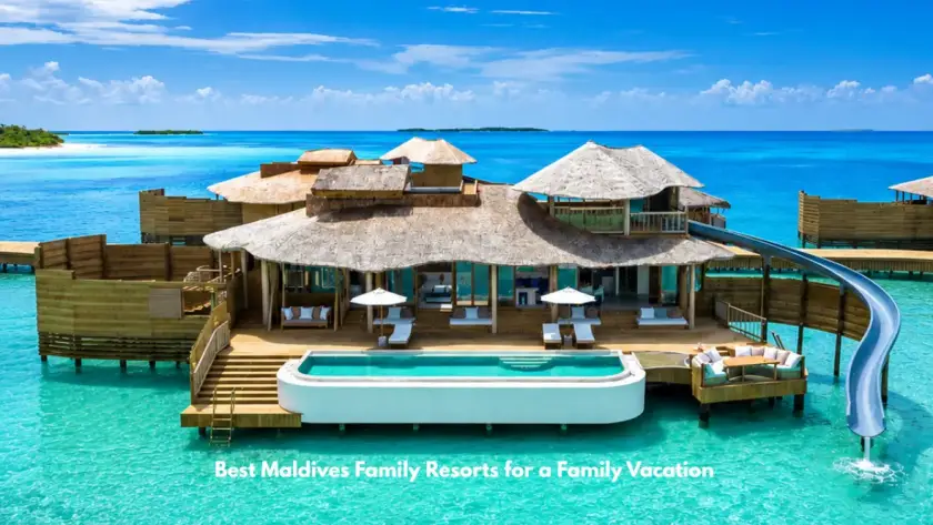 Luxury overwater villa with pool and waterslide at a Maldives family resort.
