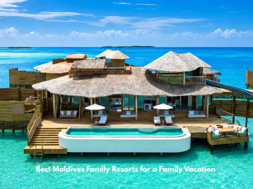 Luxury overwater villa with pool and waterslide at a Maldives family resort.