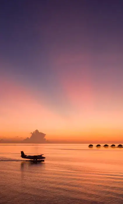 conrad-maldives-aerial-beauty-shot-dusk-seaplane-credit-justin-nicholas-hi-res-